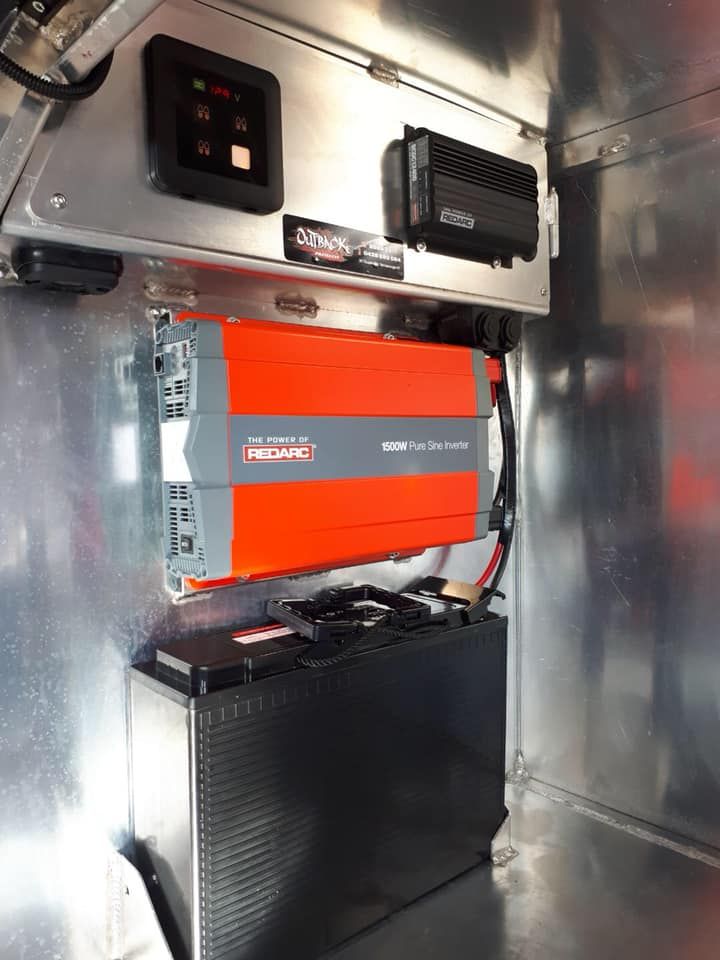 Domestic Inverter and a Large Black Battery Mounted — Outback Auto NT in Berrimah, NT