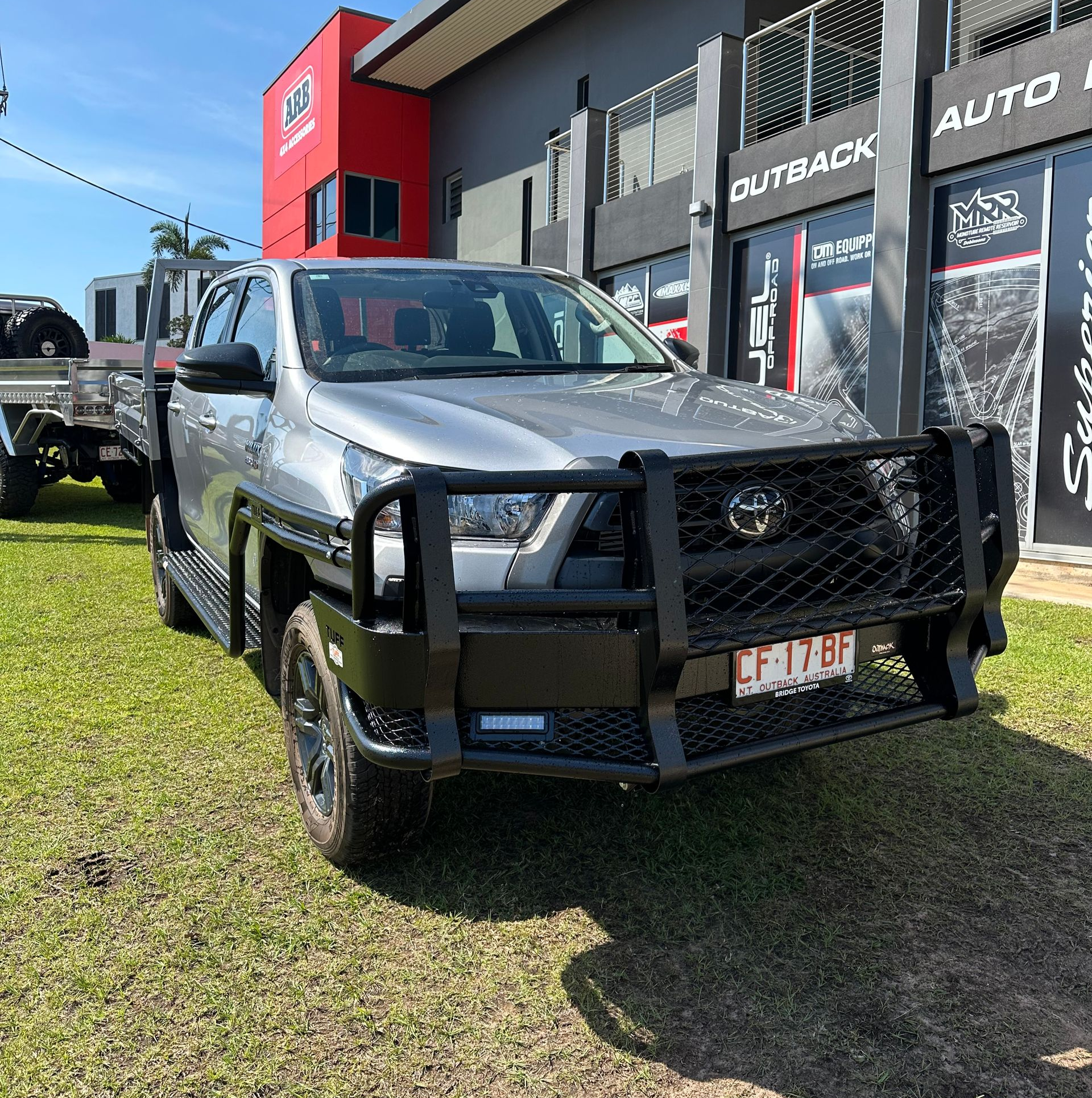 Silver pickup truck with a black grille guard parked outside an auto shop.  — Outback Auto NT in Berrimah, NT