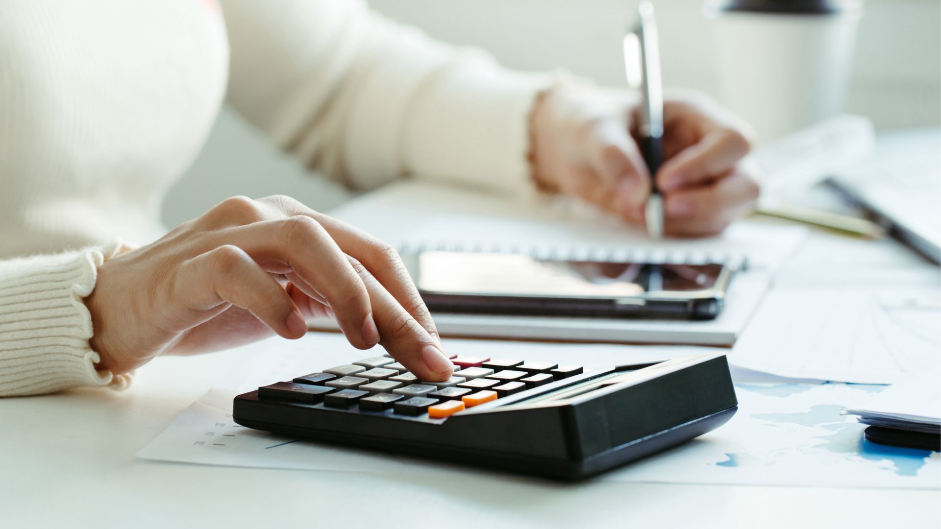 accountant calculating tax for contractors 
