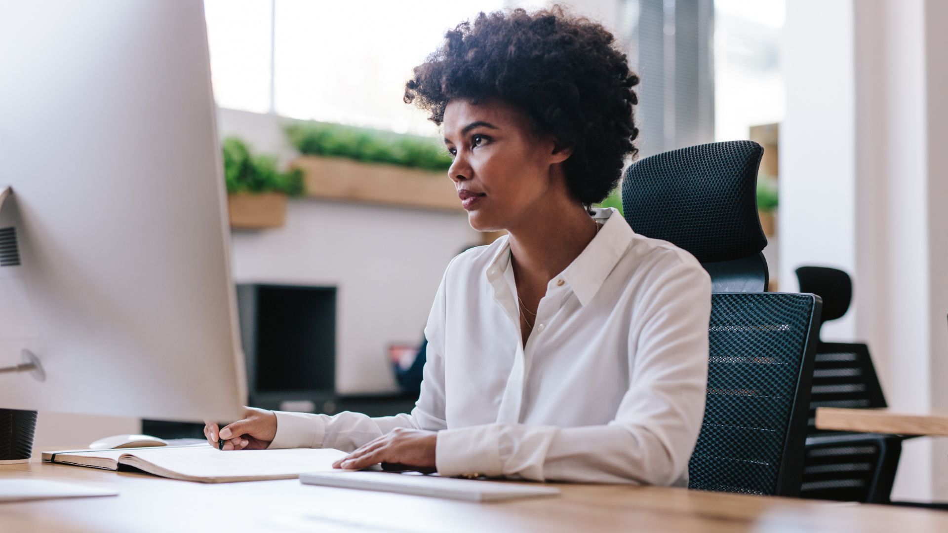 Business owner reviewing expenses with accountancy services