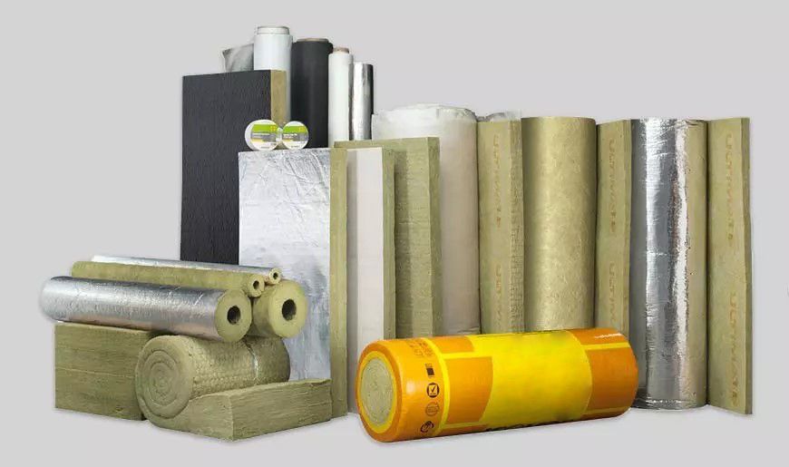 A bunch of different types of insulation are stacked on top of each other.