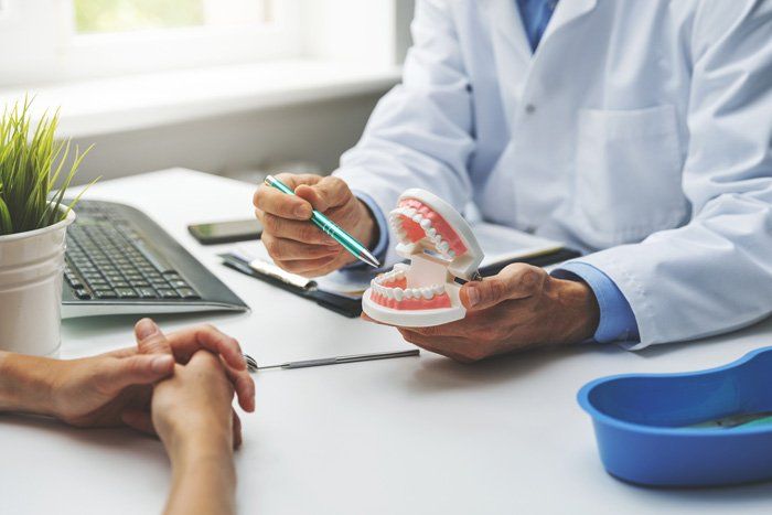 Denture Implant Consultation — Spokane, WA — Dr. Michael Readel, D.D.S.