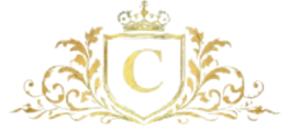 Gold ornate monogram shield with a letter C and decorative floral flourishes