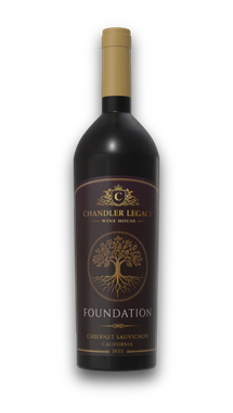 Bottle of Foundstone red wine with a gold cap and dark label on a white background