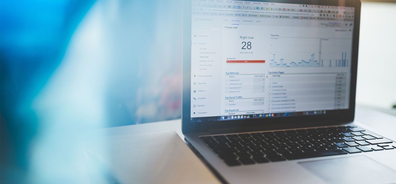 Google Analytics 4 dashboard viewed in a laptop
