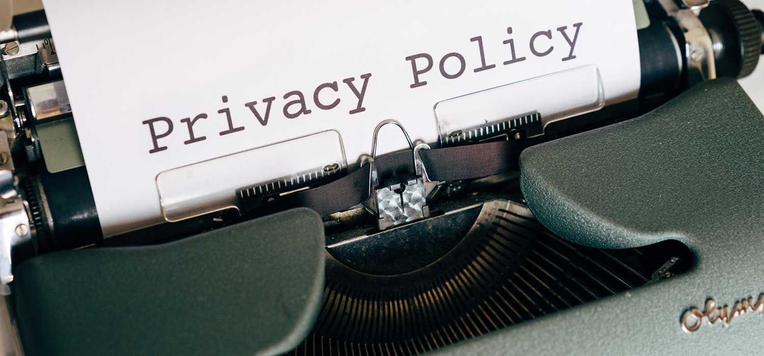 Privacy Policy being typed on a paper using typewriter
