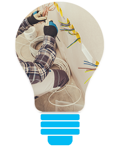 Lightbulb-shaped collage with a person holding tangled wires and colorful lines on a white background