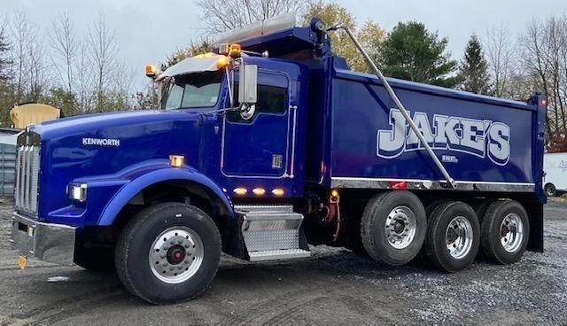 Blue Kenworth dump truck with 