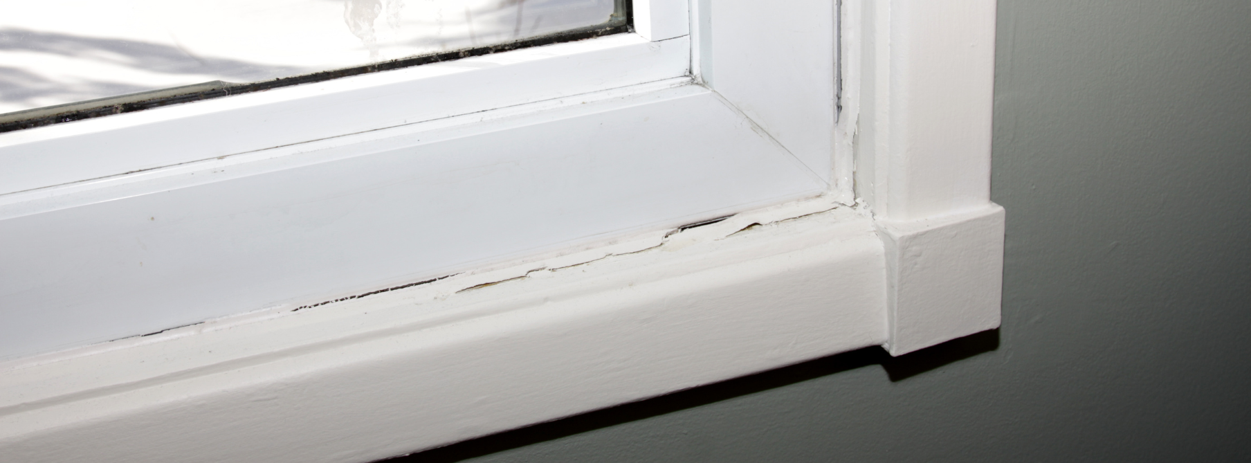 PCB ridden caulking on the windowsill of an old home