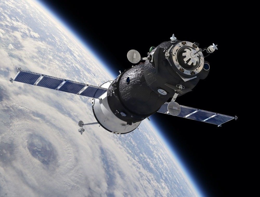 A satellite is flying over the earth in space