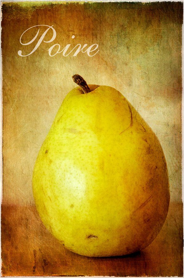 A yellow pear with the word poire written on it