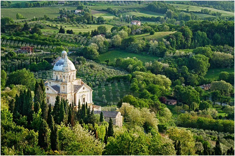 A church in the middle of a lush green valley