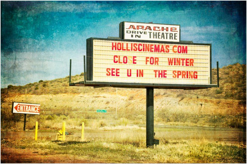 A billboard for the apache drive in theatre
