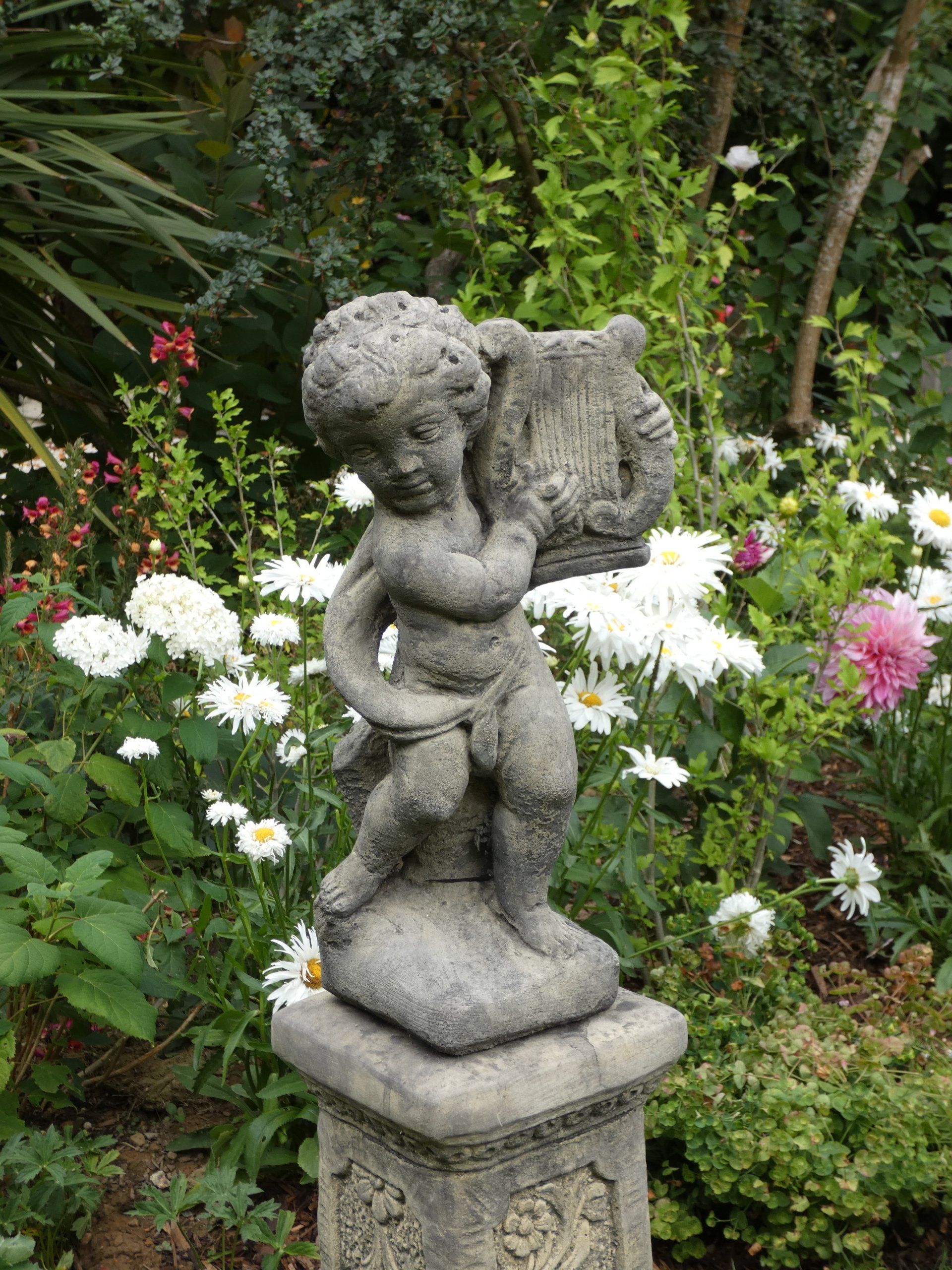 lyre player stone garden statue