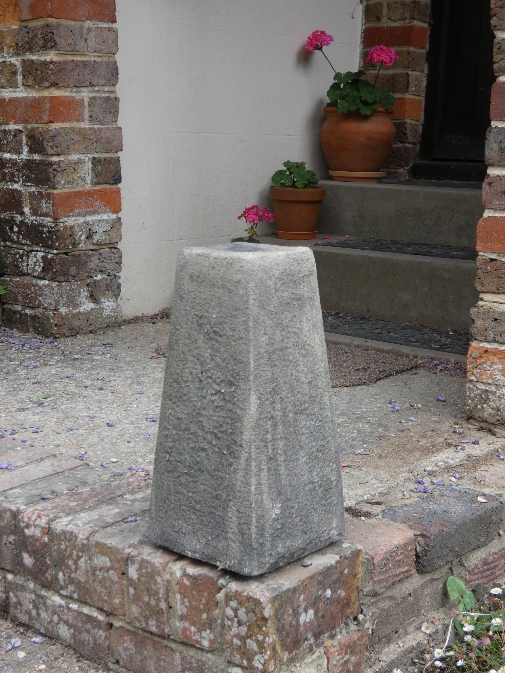 small bollard stone garden statue