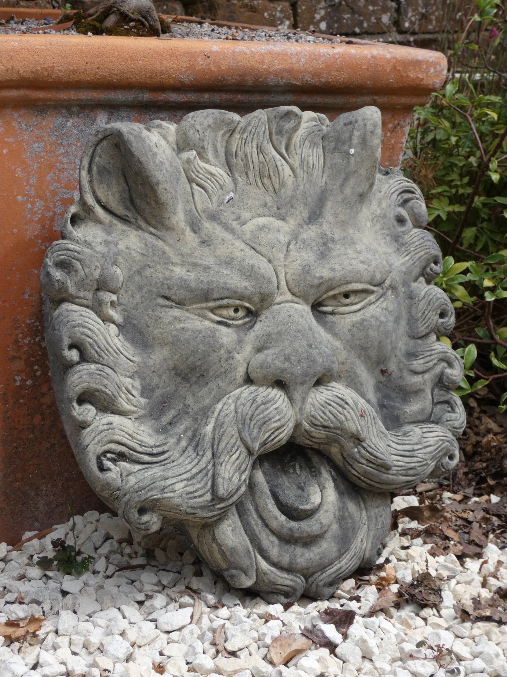 sungod plaque stone garden statue