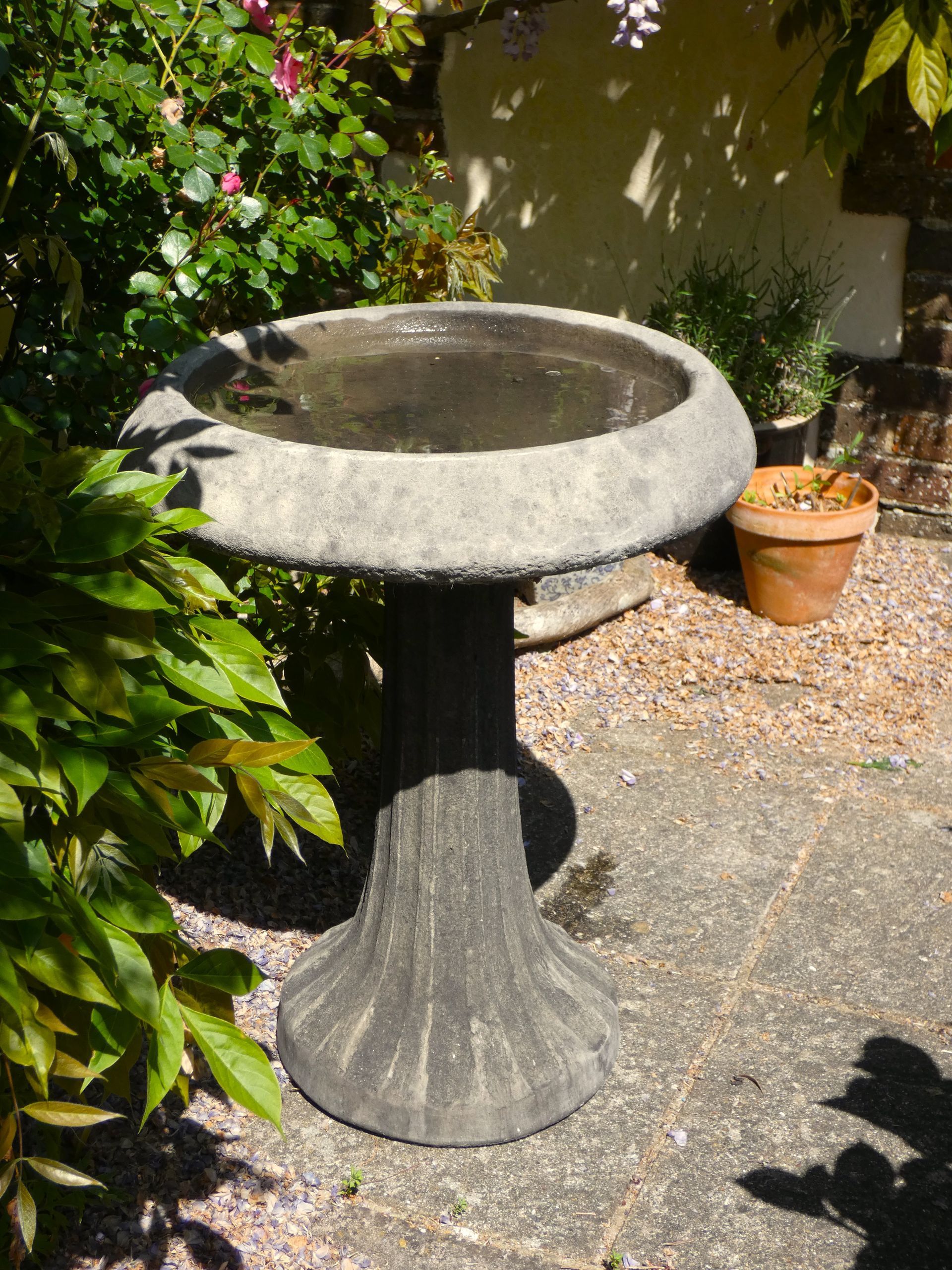 fluted birdbath stone garden statue