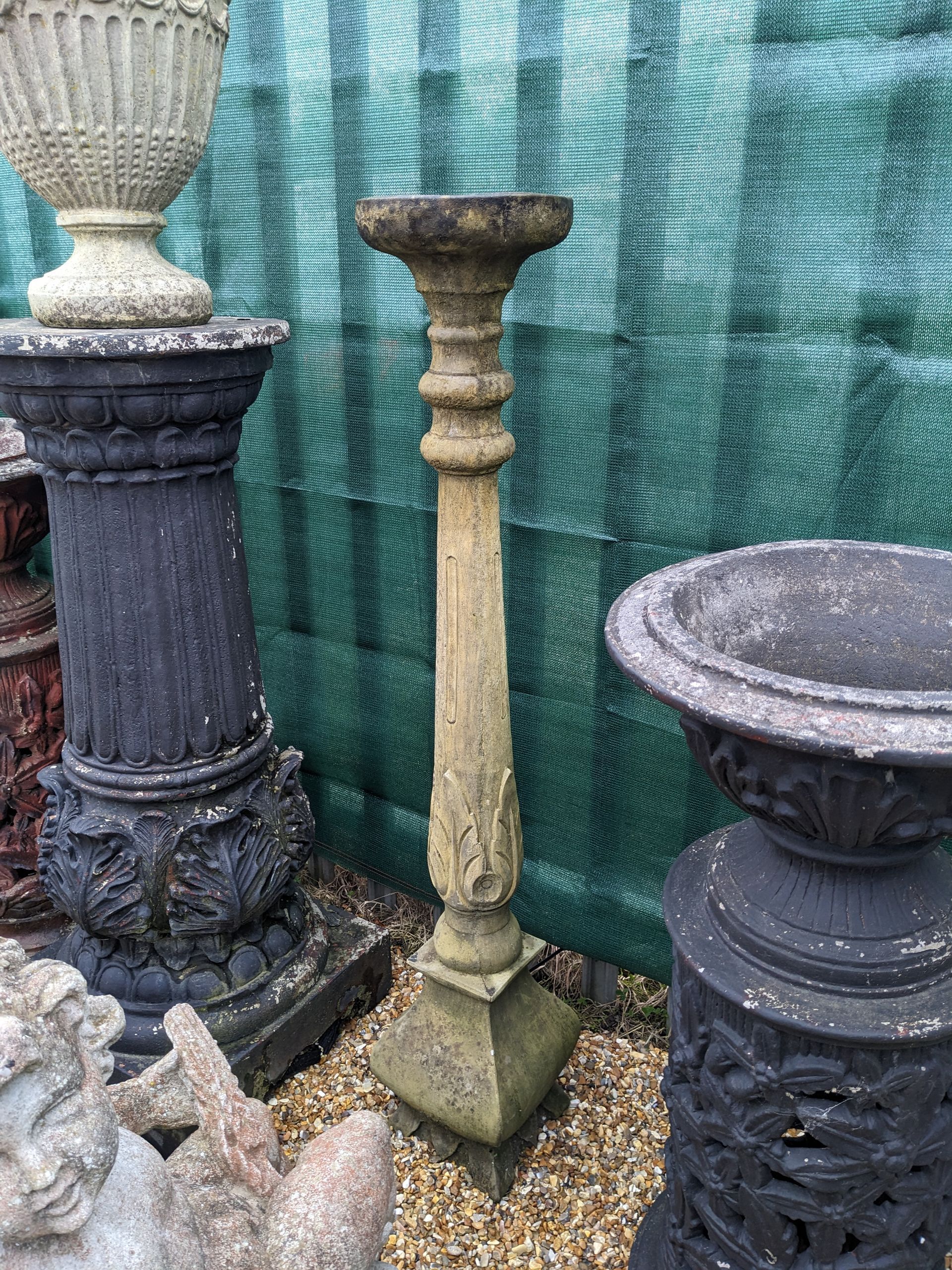 large candlestick stone garden statue