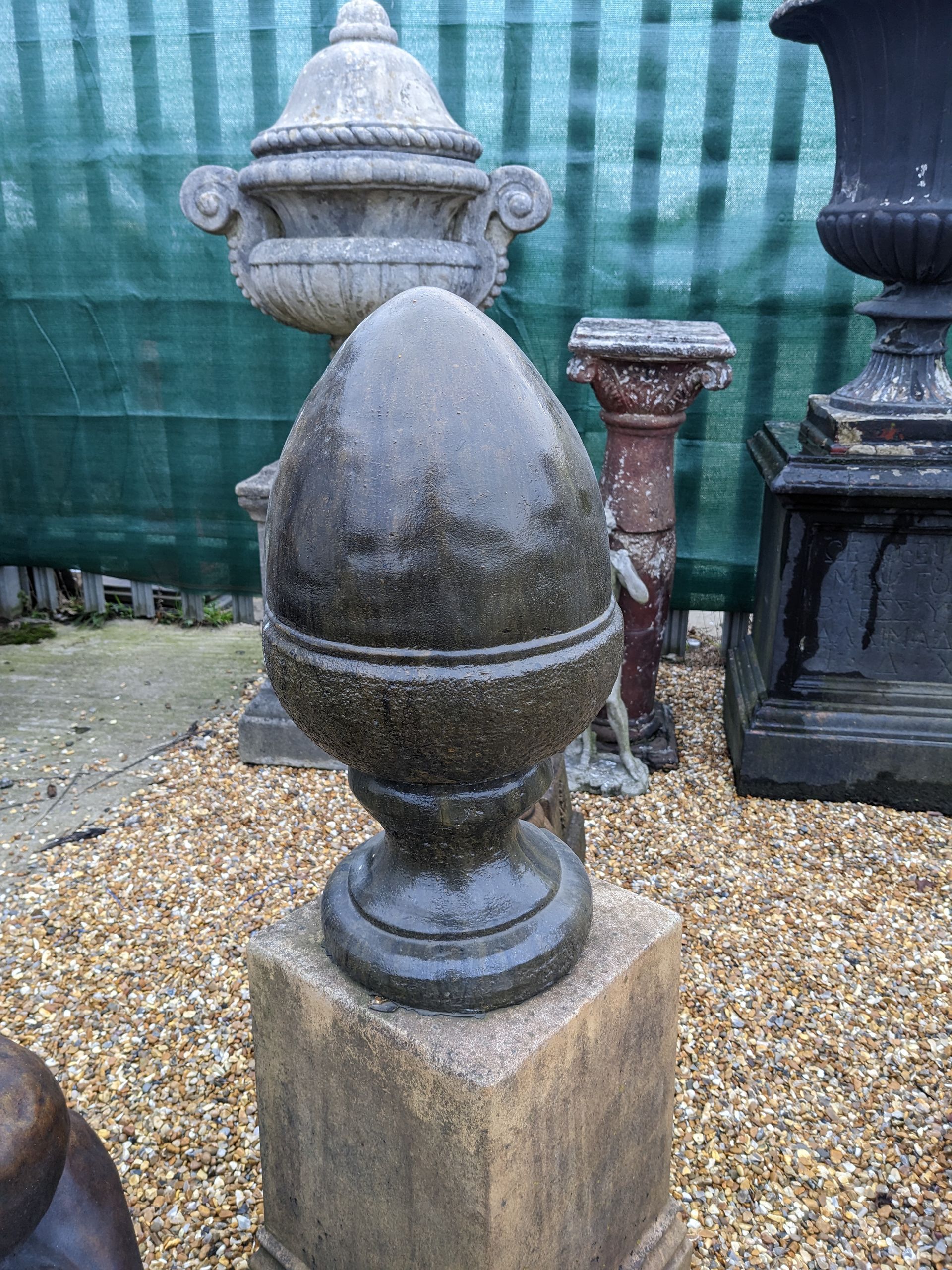 acorn finial stone garden statue