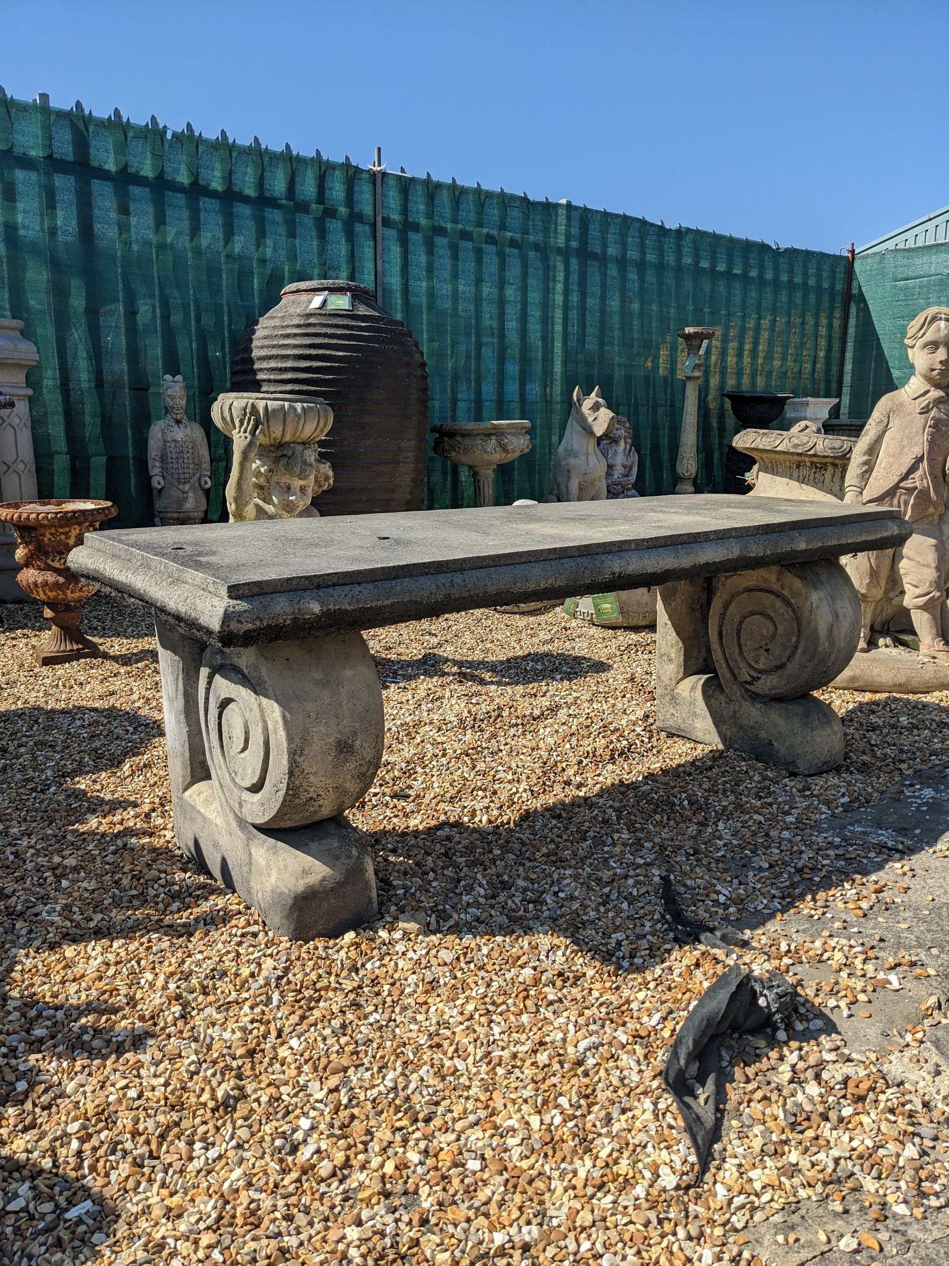 large bench stone garden statue