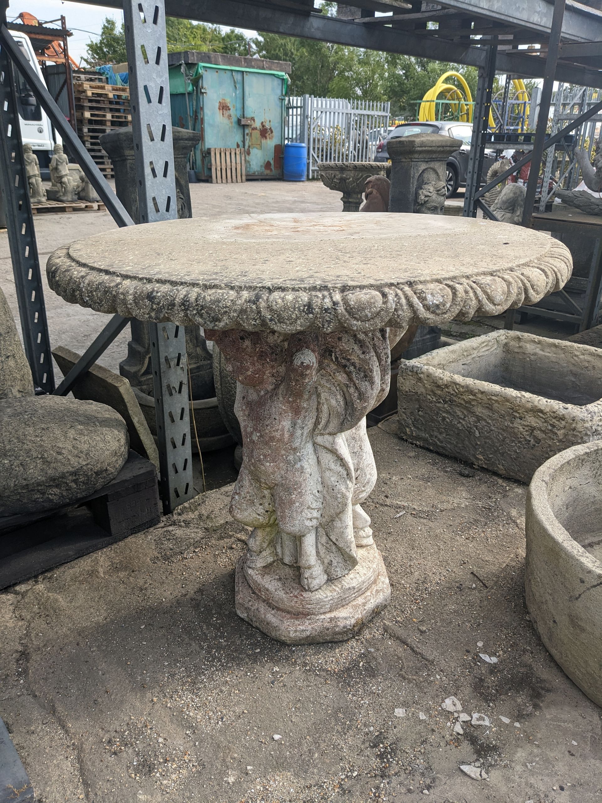 pan table stone garden statue