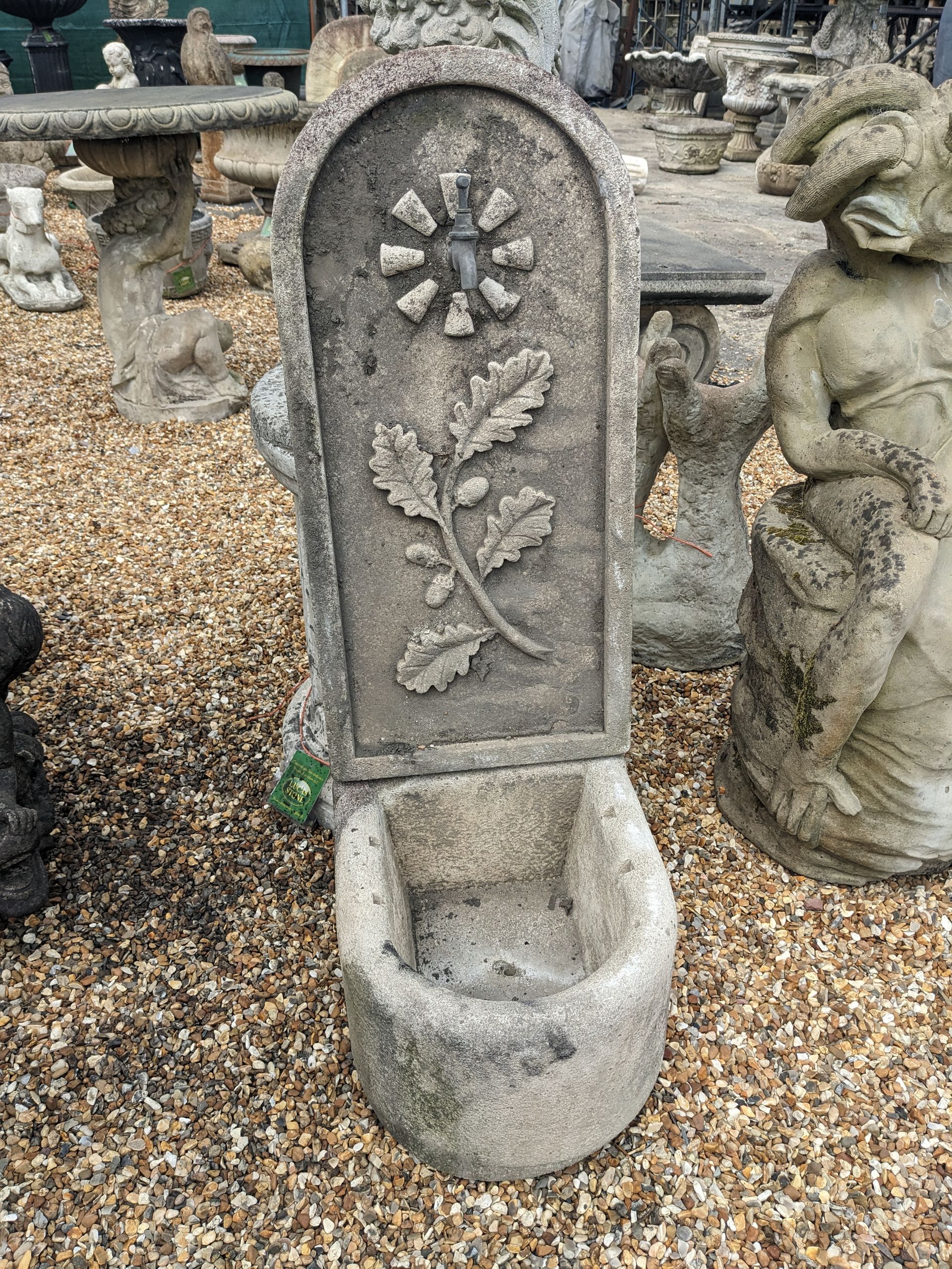 upright oak stone garden statue