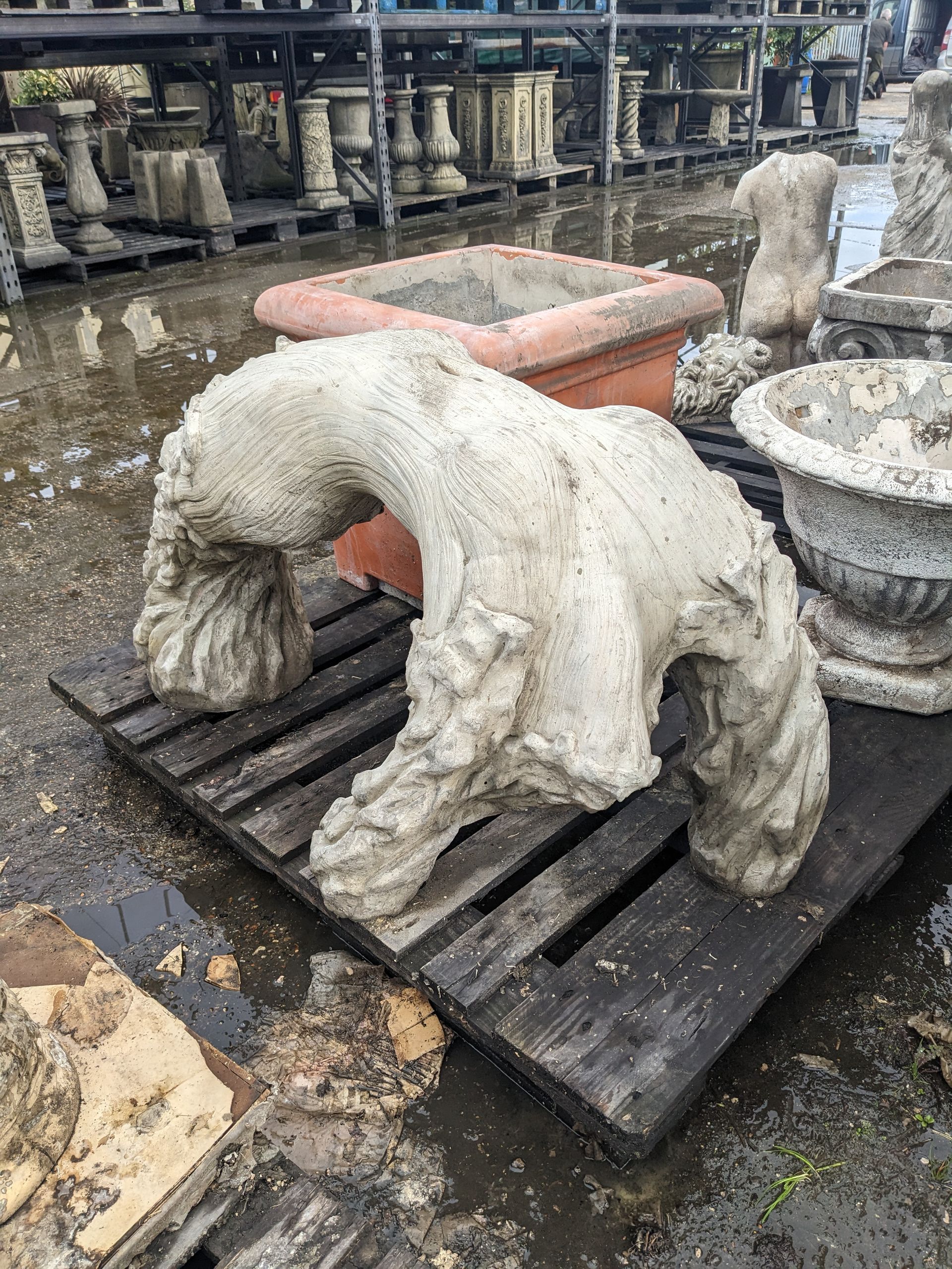 twisting torso bench seat stone garden statue