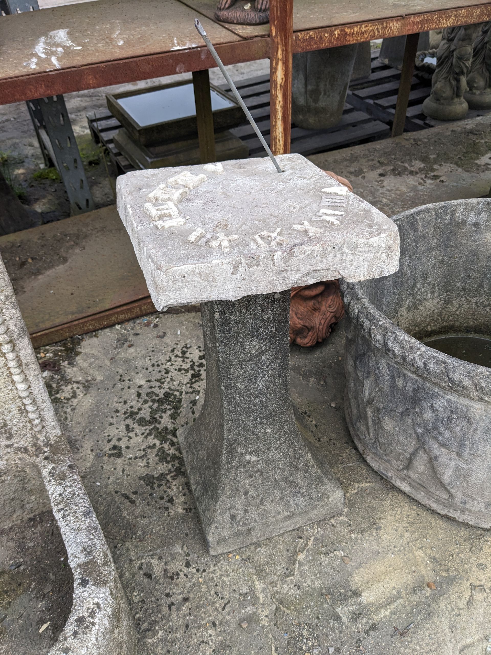 sundial stone garden statue