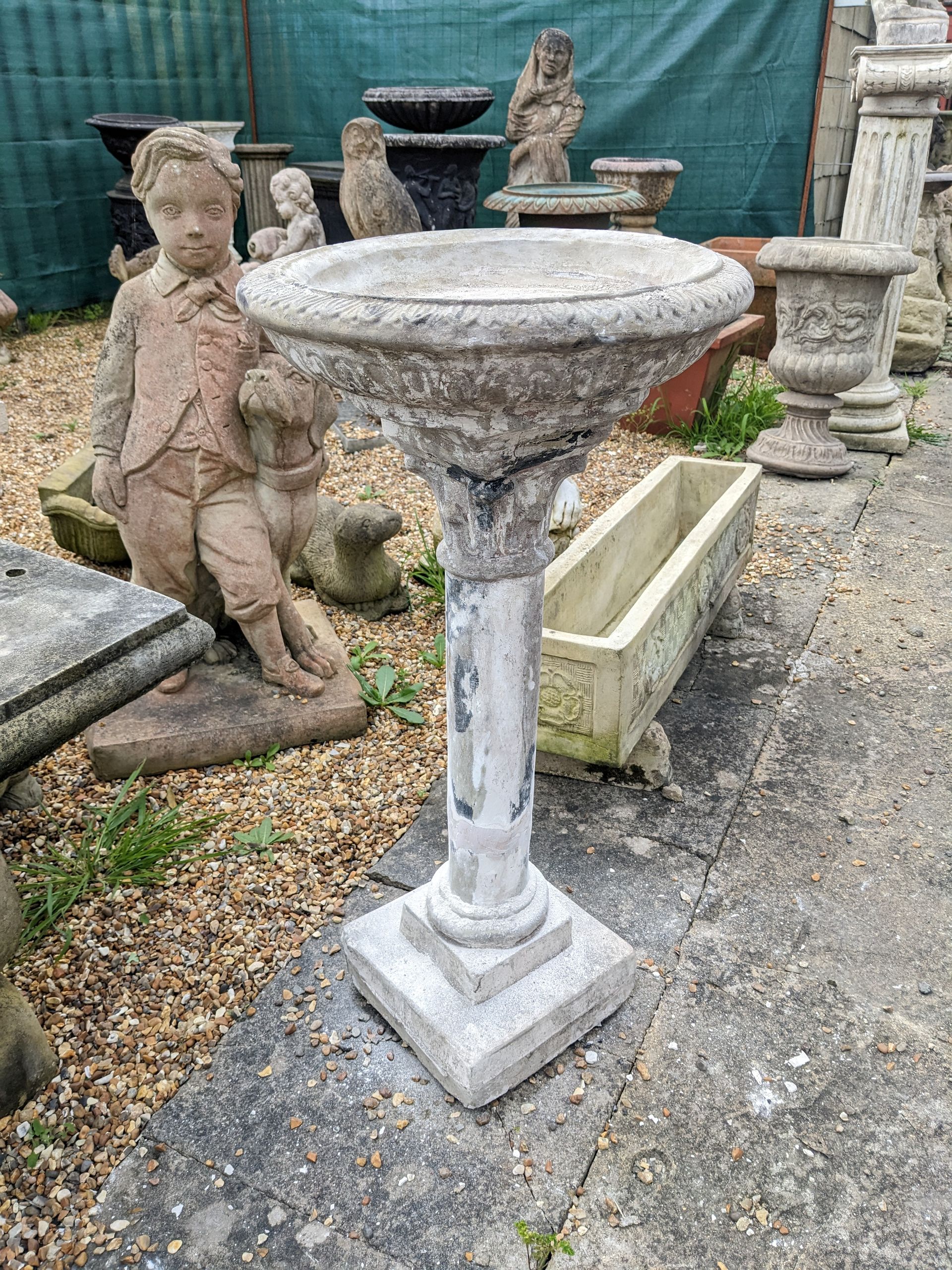 slim birdbath stone garden statue