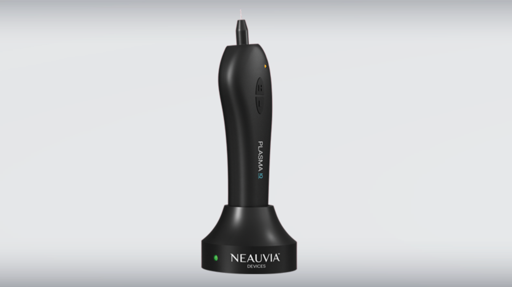 A black nealink device is sitting on a white surface