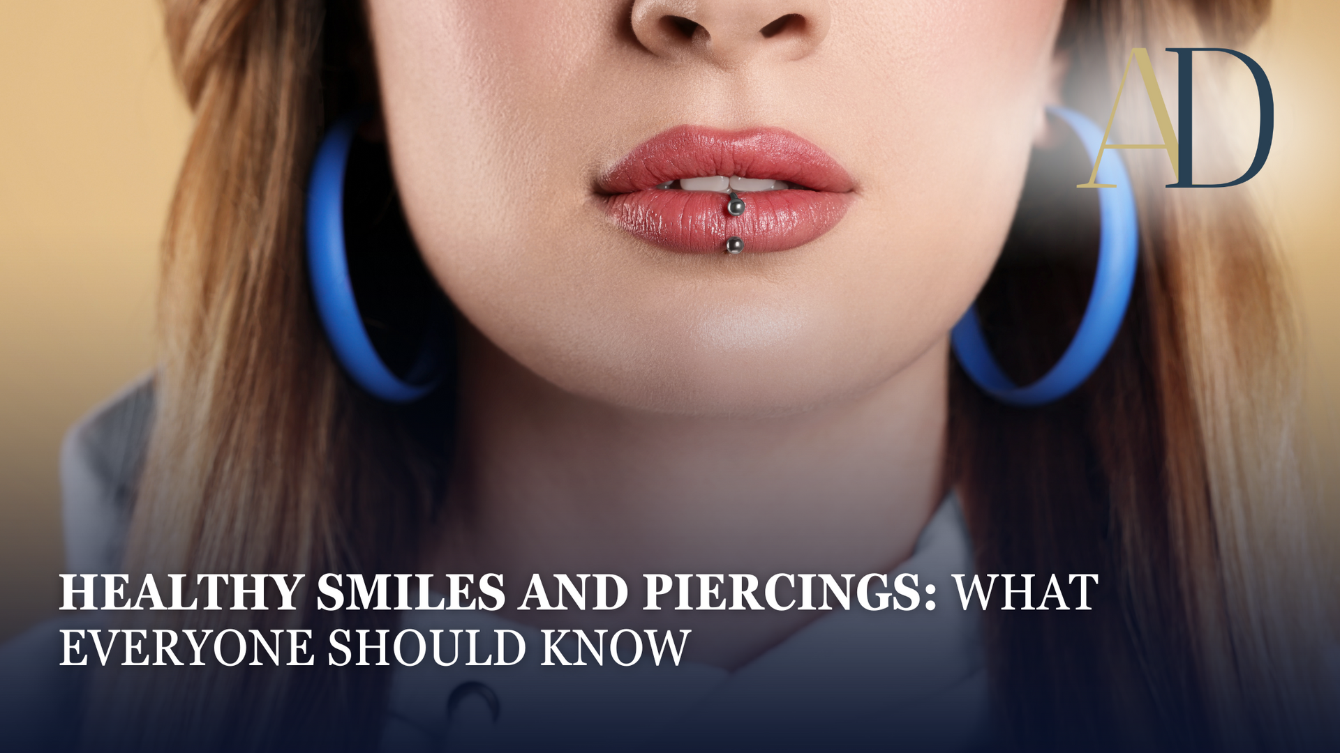 Close-up of a person with blue hoop earrings and lip piercings, with text about healthy smiles and piercings