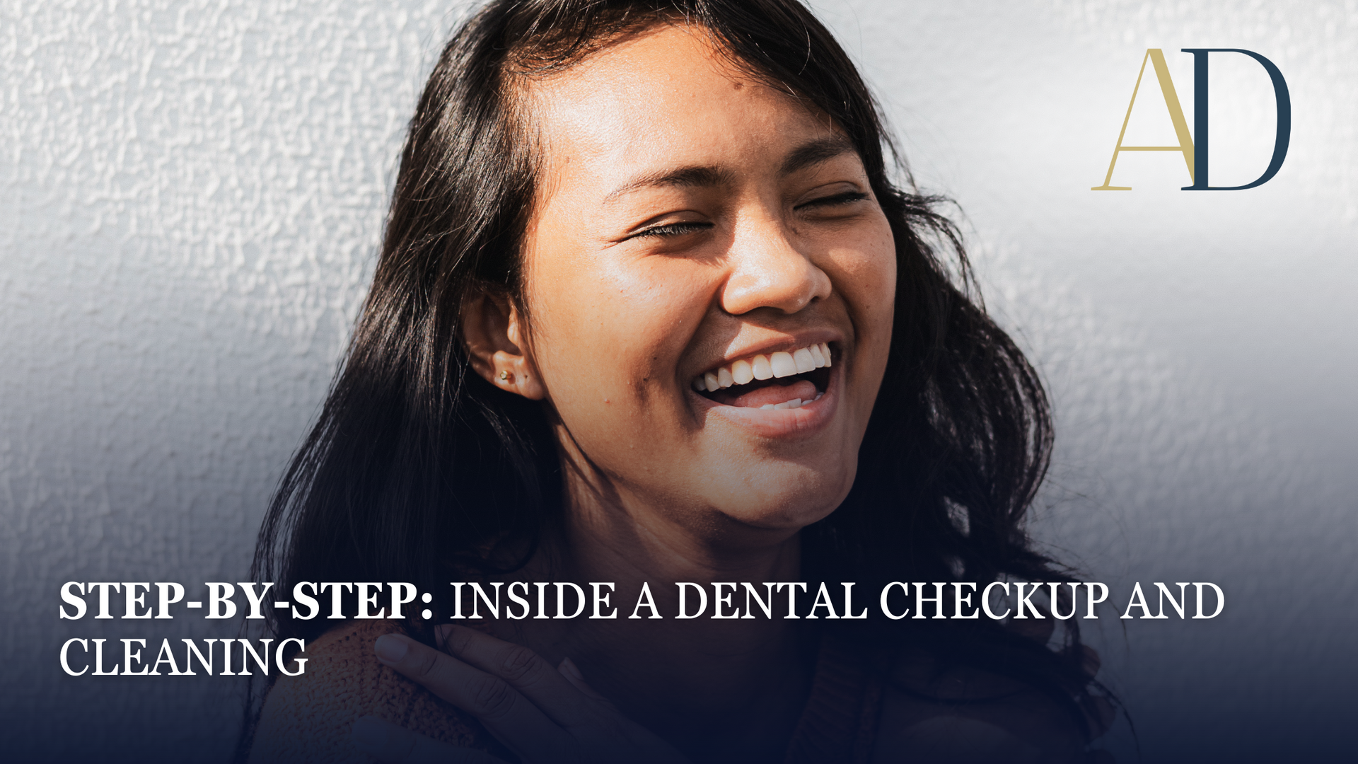 Smiling woman in dark clothing beside text: “Step-by-step: Inside a dental checkup and cleaning”