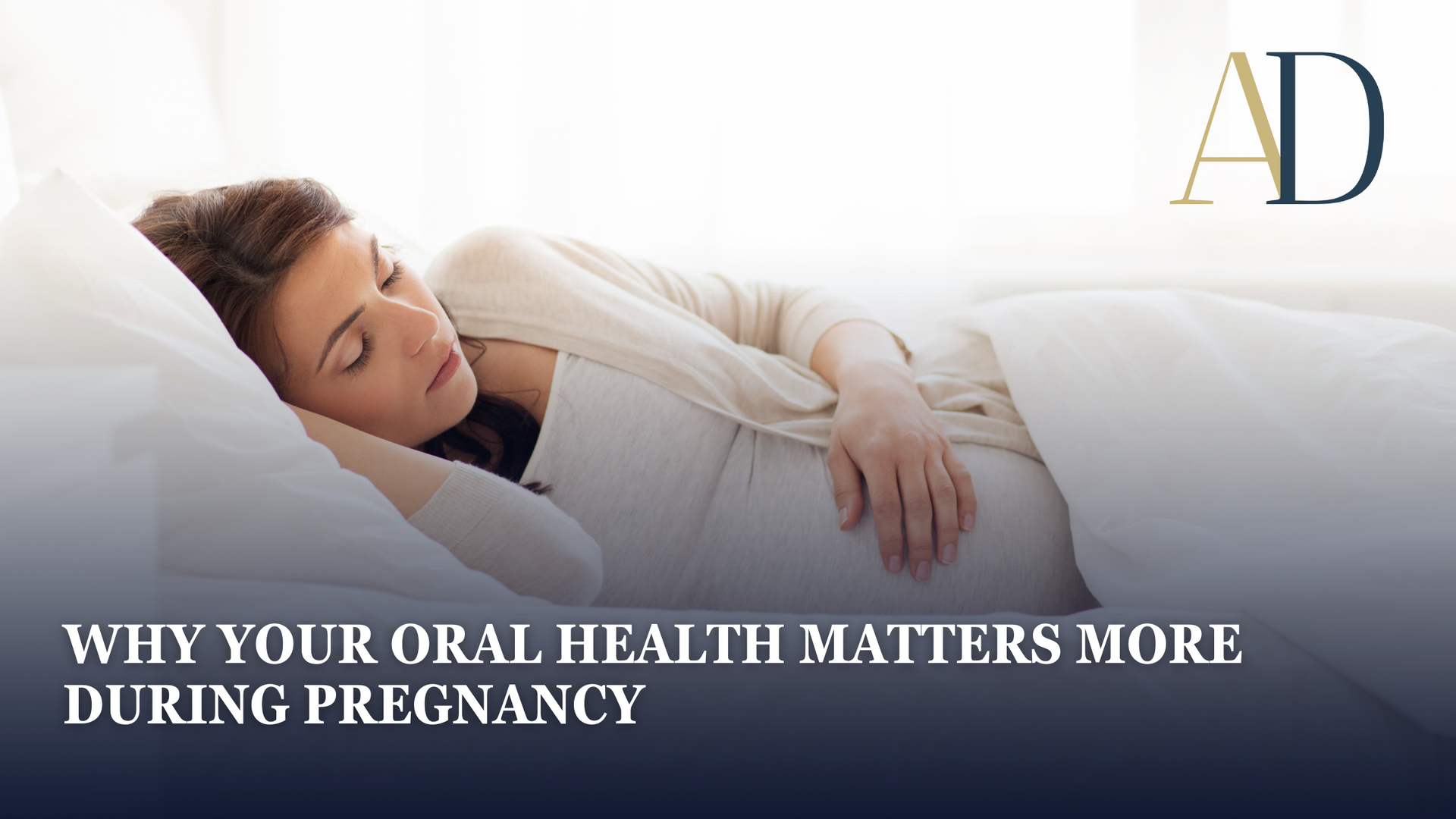 Sleeping pregnant woman in white with text, “Why your oral health matters more during pregnancy”