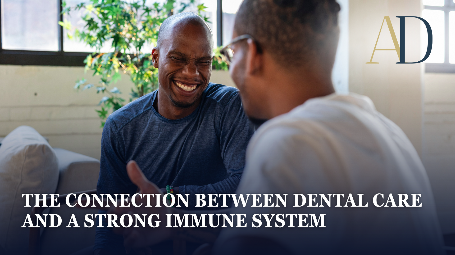 Two people talking in a bright room with the text “The connection between dental care and a strong immune system.”