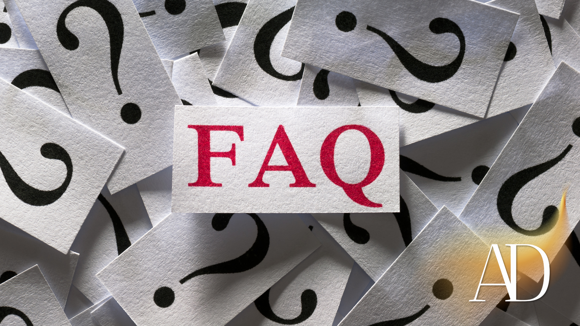 FAQ text over a background of scattered question marks, with a small AD label in the corner