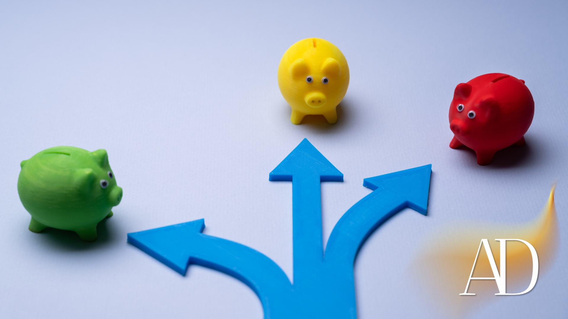 Blue arrows pointing to green, yellow, and red piggy banks on a light background