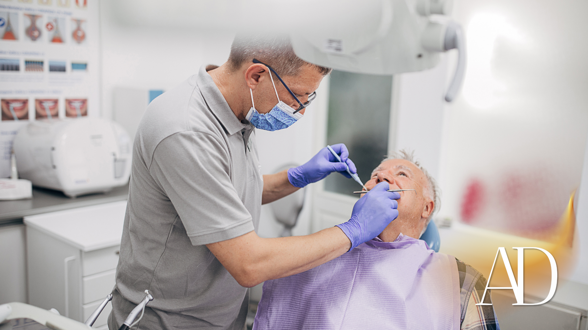 Dentist examining a patient in a bright clinic, wearing mask and gloves, using dental tools