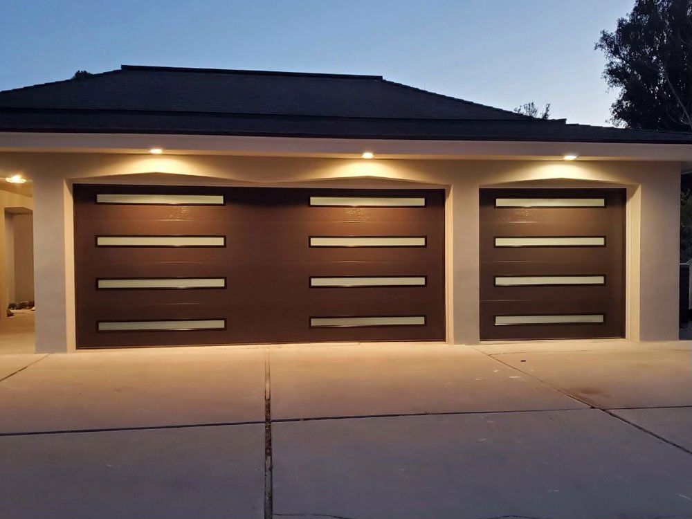 New residential garage door in night time