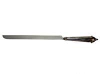 A cake knife with a metal handle