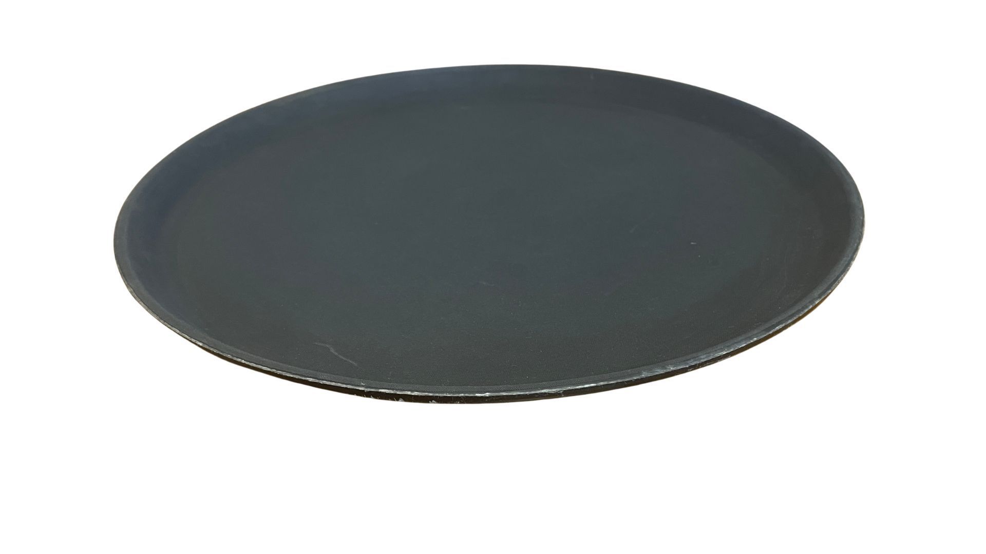 A black tray with a black rim on a white background.