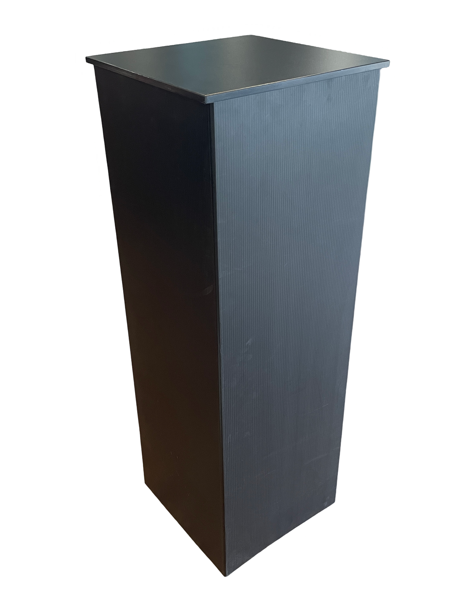 A black pedestal on a white background