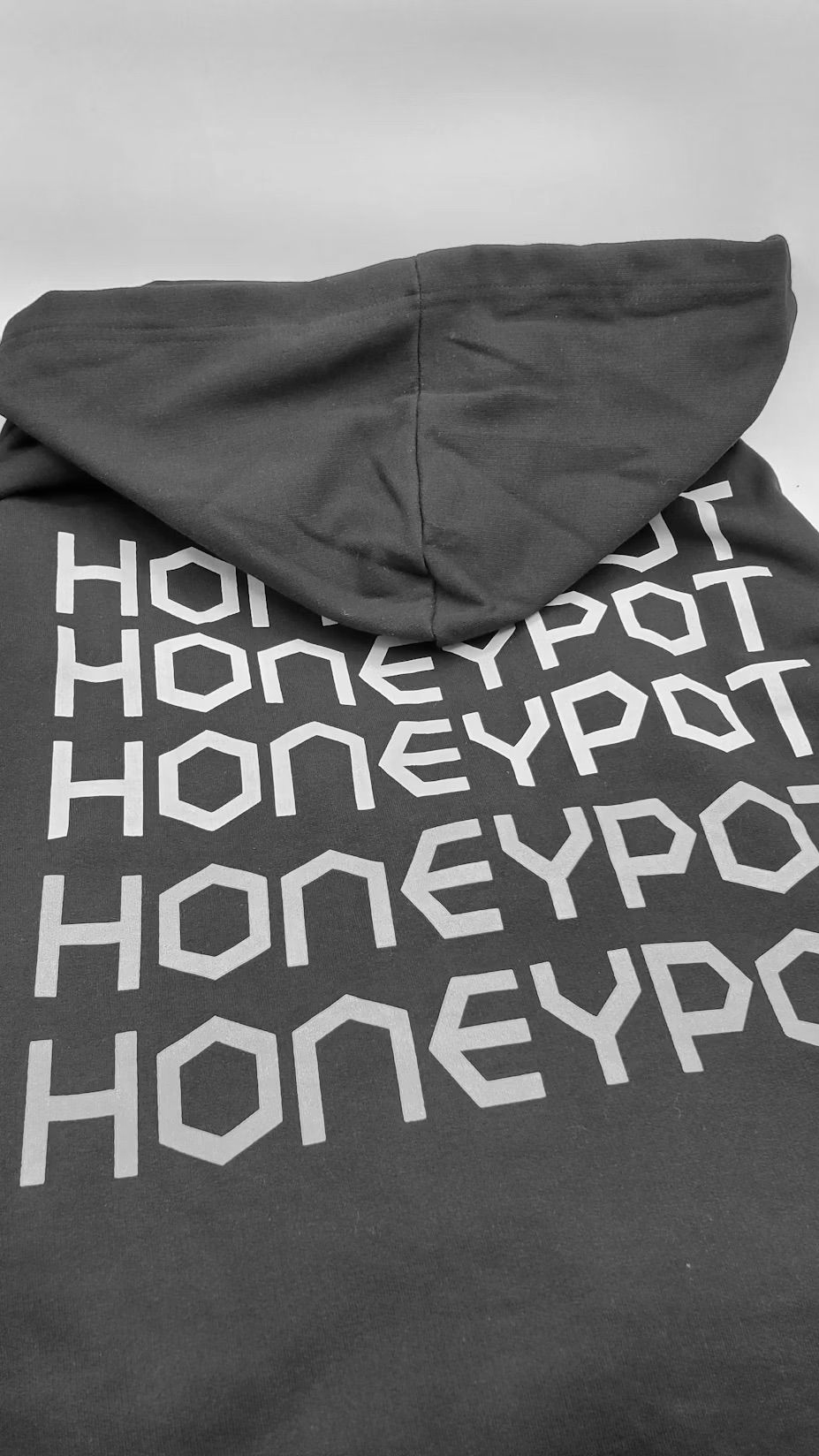 A gray hoodie with 