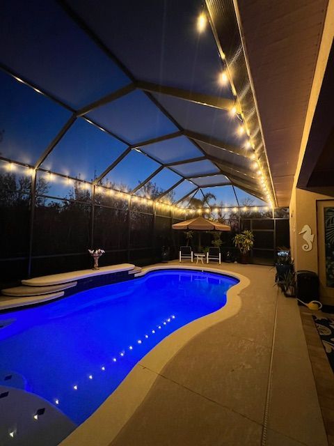 Illuminated screened pool area.

