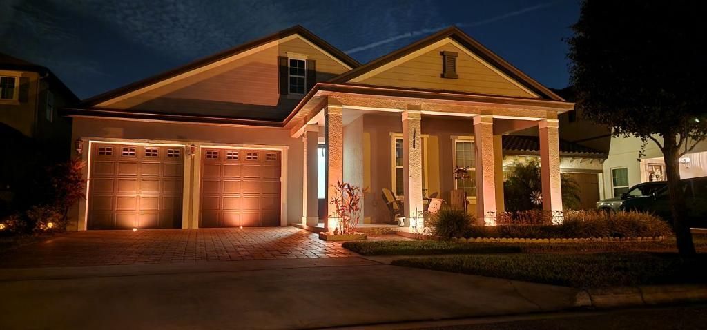 Warmly lit house exterior
