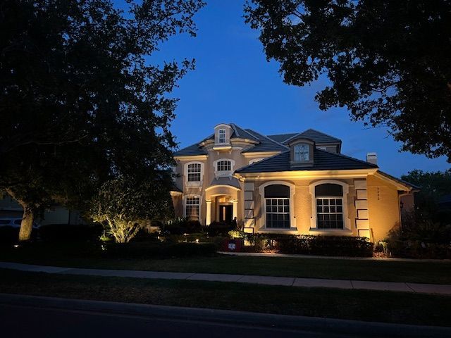Lit house at night
