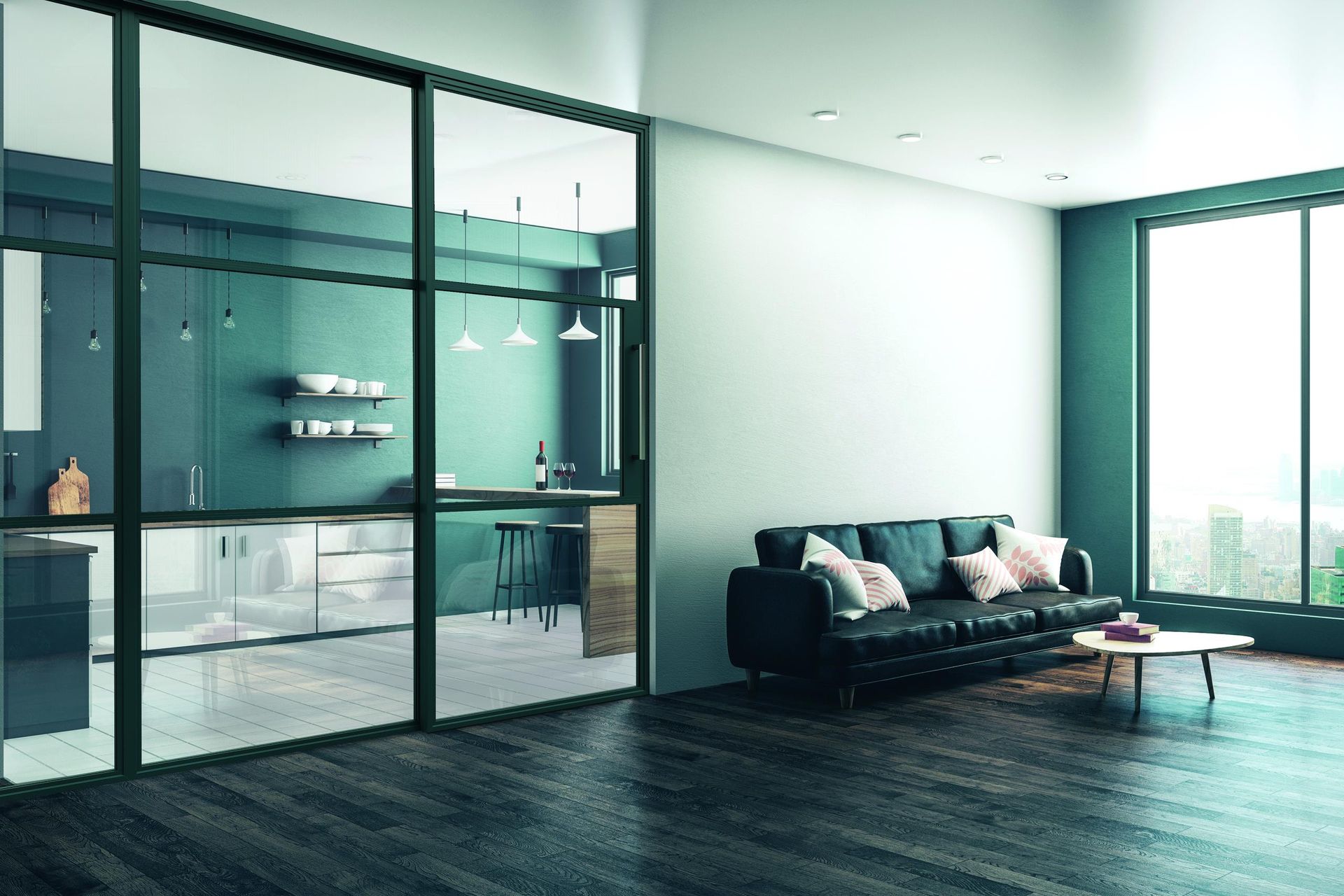 A living room with a dark leather sofa next to a glass-walled kitchen featuring dark teal walls and wooden accents.
