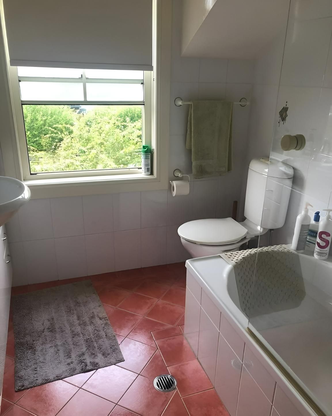 A Before Image of Bathroom with A Toilet, Sink and Bathtub — Bowral Bathrooms in Exeter, NSW