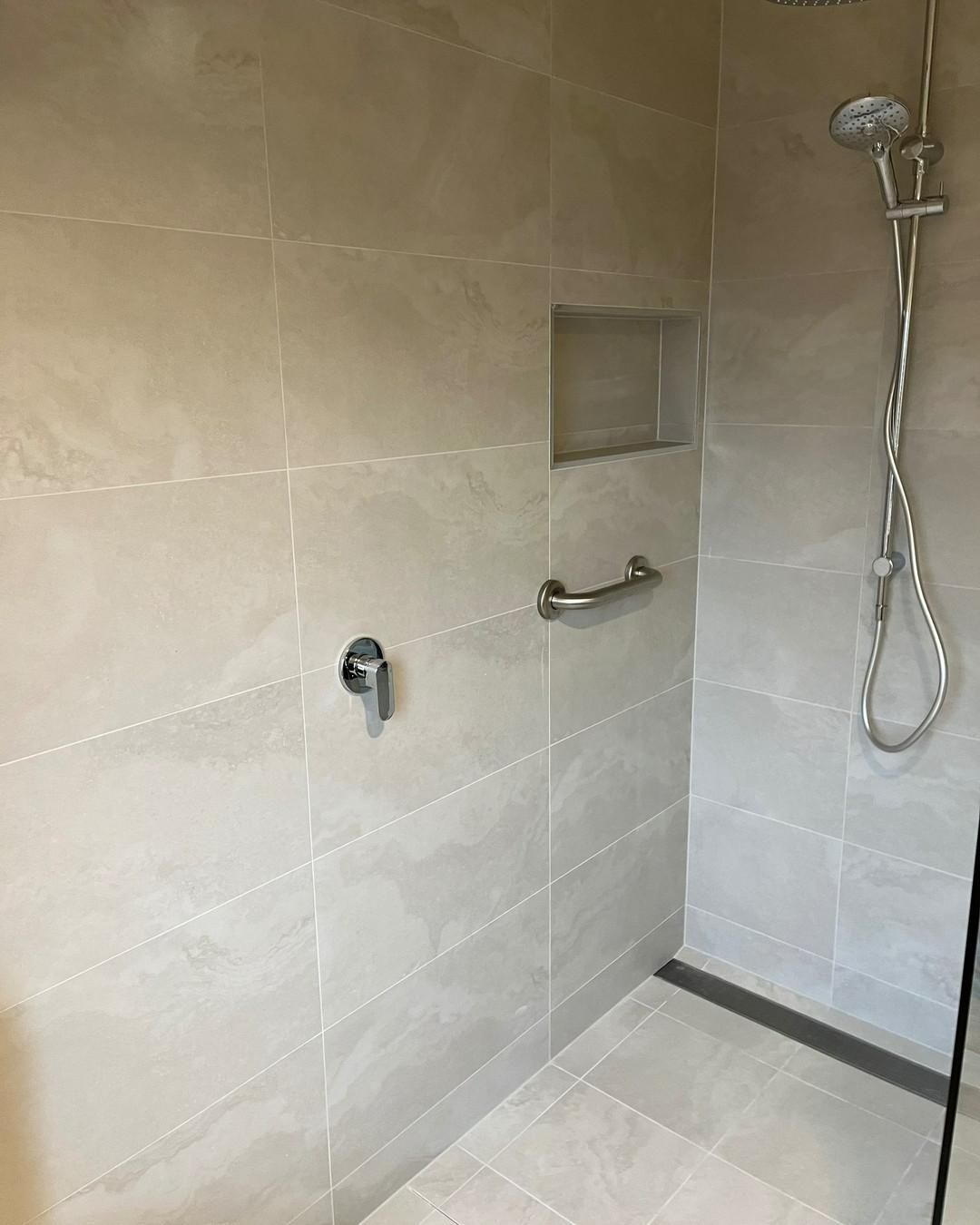 A Bathroom with A Walk in Shower and A Hand Rail — Bowral Bathrooms in Exeter, NSW