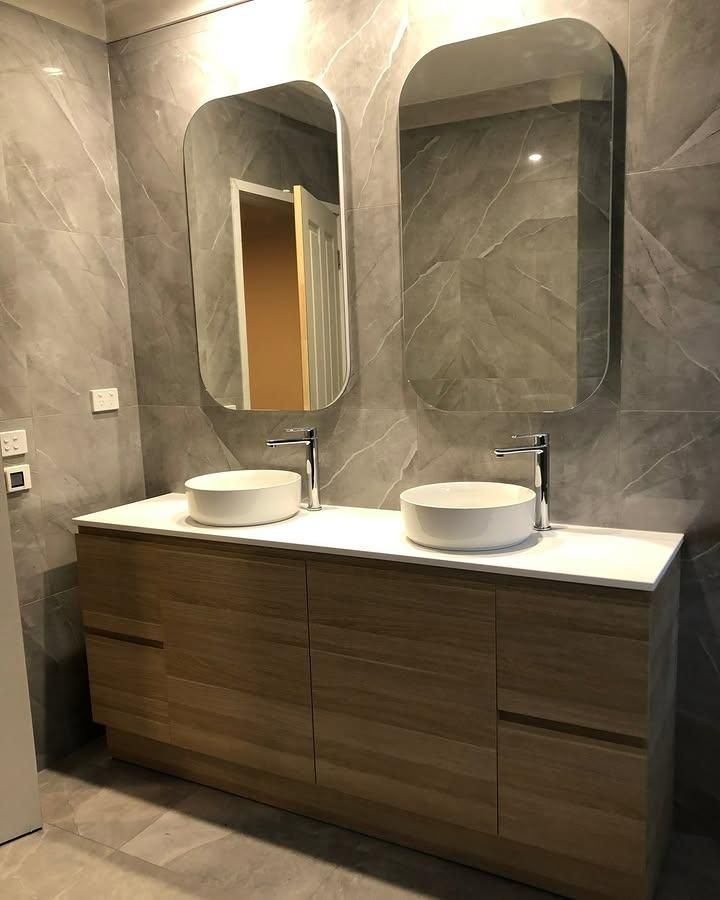 A Lit Bathroom with Two Sinks and Two Mirrors — Bowral Bathrooms in Exeter, NSW