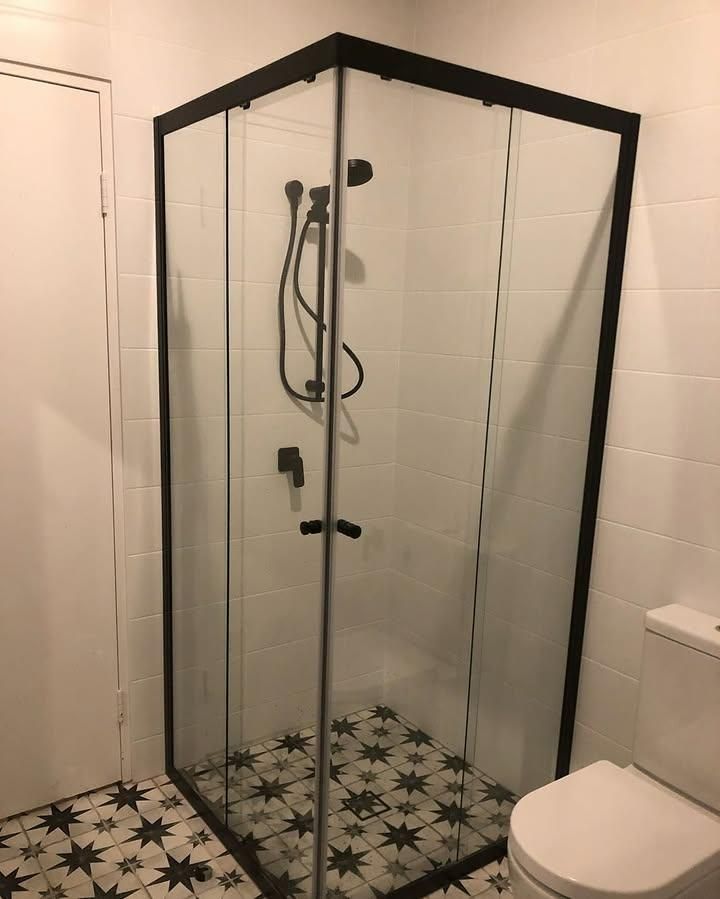A Bathroom with A Shower Stall and A Toilet — Bowral Bathrooms in Exeter, NSW